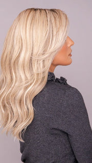 ROXIE wearing MILANO by BELLETRESS in MILKSHAKE BLONDE R | A mixture of Light Sandy Brown, Highlighted with Light Ash Blonde with a Hint of Light Platinum Blonde with a Medium Root Color