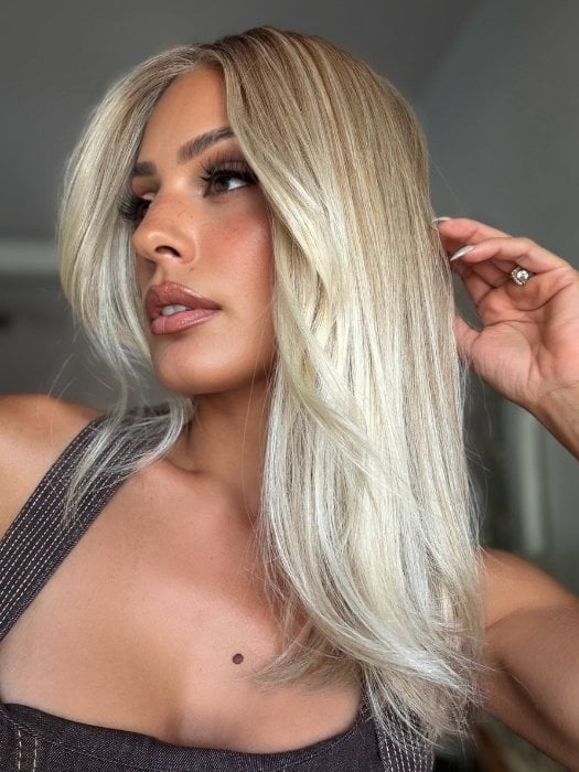 Roxie wearing BOX OFFICE BEAUTY by RAQUEL WELCH in SS19/23 SHADED BISCUIT | Cool Platinum Blonde with subtle highlights and Medium Brown roots