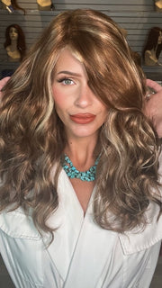 Madeline wearing SARAH by JON RENAU in FS26/31 CARAMEL SYRUP | Medium Natural Red Brown with Medium Red Gold Blonde Bold Highlights