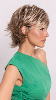 Roxie wearing TREND SETTER by RAQUEL WELCH in SS12/22 SHADED CAPPUCCINO | Light Golden Brown Evenly Blended with Cool Platinum Blonde Highlights and Dark Roots
