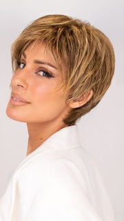 Model is wearing SHARI by ENVY in color 24/18 FROSTED | Light Brown with Wheat Blonde blended highlights