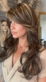 Madeline wearing LILLY by BELLETRESS in CHOCOLATE BUTTERCREAM R | Medium and Dark Brown Rooted with a Blend of Medium Brown and Dark Blonde
