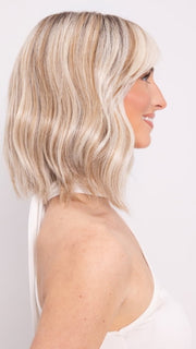 Ava wearing HOLLIE by JON RENAU in 101/88/27S8 CATALINA BLONDE | Pale blonde with Pure White Natural Violet halo highlights, shaded medium brown