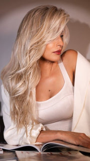 Roxie is wearing RUNWAY REHEARSAL by RAQUEL WELCH in RL19/23SS SHADED BISCUIT | Light Ash Blonde Evenly Blended with Cool Platinum Blonde with Dark Roots
