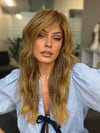 Roxie is wearing CALIFORNIA BEACH WAVES by TRESSALLURE in color 24/18T 24/18T | Dark Ash Blonde