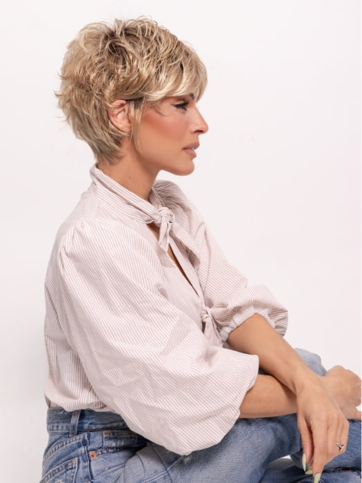 Roxie wearing SPARKLE by RAQUEL WELCH in SS14/88H SHADED GOLDEN WHEAT | Dark Blonde Evenly Blended with Pale Blonde Highlights and Dark Roots