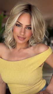 Roxie wearing BRADSHAW by BELLETRESS in MILKSHAKE BLONDE R | A mixture of Light Sandy Brown, Highlighted with Light Ash Blonde with a Hint of Light Platinum Blonde with a Medium Root Color