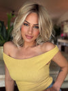 Roxie wearing BRADSHAW by BELLETRESS in MILKSHAKE BLONDE R | A mixture of Light Sandy Brown, Highlighted with Light Ash Blonde with a Hint of Light Platinum Blonde with a Medium Root Color