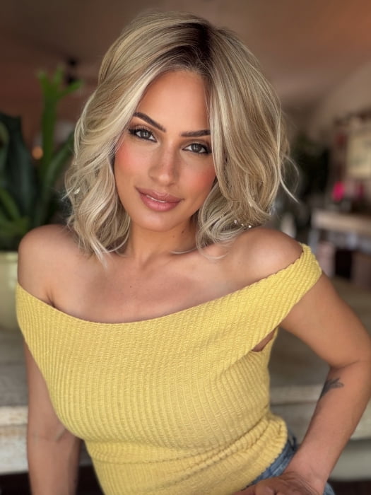 Roxie wearing BRADSHAW by BELLETRESS in MILKSHAKE BLONDE R | A mixture of Light Sandy Brown, Highlighted with Light Ash Blonde with a Hint of Light Platinum Blonde with a Medium Root Color