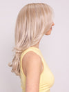 Ava wearing Brooklyn by Belletress in CRUSHED ALMOND BLONDE R | A soft Neutral Light Blonde with a Light and Medium Blended Root Color.