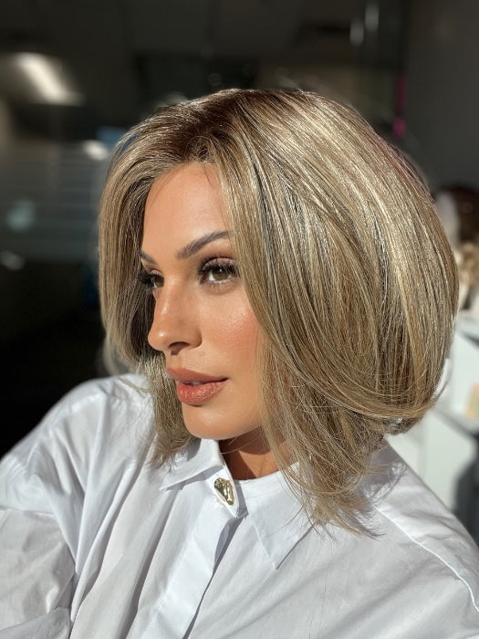 Roxie wearing ALWAYS TRENDING by RAQUEL WELCH inSS12/22 SHADED CAPPUCCINO | Light Golden Brown Evenly Blended with Cool Platinum Blonde Highlights with Dark Roots