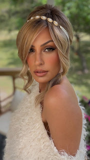 Roxie wearing KELLY by BELLETRESS in BUTTERCAKE BLONDE-R | A neutral-warm blonde blend featuring light brown, ash, and lightest blonde tones with natural-looking darker roots for added depth and realism.