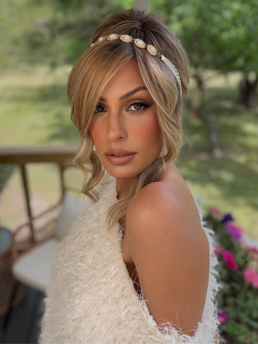 Roxie wearing KELLY by BELLETRESS in BUTTERCAKE BLONDE-R | A neutral-warm blonde blend featuring light brown, ash, and lightest blonde tones with natural-looking darker roots for added depth and realism.