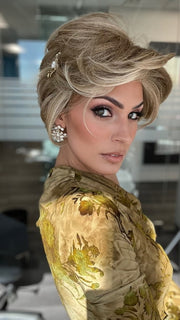 ROXIE wearing CAPTIVATING CANVAS by RAQUEL WELCH in RL13/88 Golden Pecan | Neutral Medium Blonde With Pale Honey Blonde Highlights