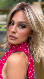 Roxie wearing MODENA by BELLETRESS in RAW SUGAR BLONDE | A Neutral Light Blonde, Honey Blonde, Pale Gold Blonde, with a base of Light Brown Lowlights featuring a Medium Root Color