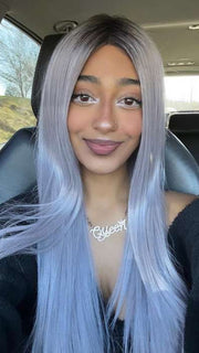 Shyla @stylewithshyla wearing LAVISH WAVEZ (straightened) by RENE OF PARIS in color LUNAR-HAZE | Dark brown base light lavender mix