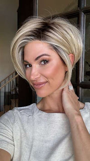Katy C. @thewigeducator wearing IGNITE PETITE by JON RENAU in color 22F16S8 VENICE BLONDE | Light Ash Blonde and Light Natural Blonde Blend Shaded with Medium Brown FB MAIN IMAGE