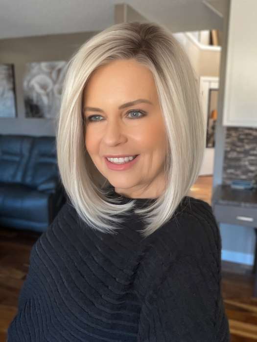 Donna @style.me.ageless wearing CURRENT EVENTS by RAQUEL WELCH WIGS in color RL16/22SS SHADED ICED SWEET CREAM | Pale Blonde with Slight Platinum Highlighting with Dark Roots