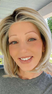 Alicia F. @wigginout wearing BIG TIME by RAQUEL WELCH WIGS in color RL19/23SS SHADED BISCUIT | Light Ash Blonde Evenly Blended with Cool Platinum Blonde with Dark Roots | outdoor lighting