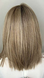 Kristyna Moore @kristynamoore wearing DRIVE by ELLEN WILLE in color BERNSTEIN ROOTED 12.24.27 | Light Brown base with subtle Light Honey Blonde and Light Butterscotch Blonde highlights and Dark Roots