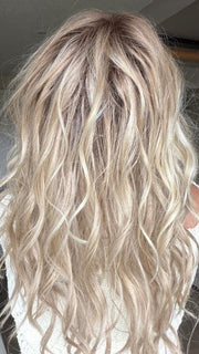 Carly wearing LIVERPOOL by BELLETRESS in MILKSHAKE BLONDE R | A mixture of Light Sandy Brown, Highlighted with Light Ash Blonde with a Hint of Light Platinum Blonde with a Medium Root Color
