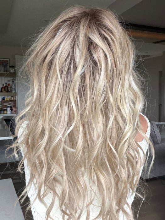 Carly wearing LIVERPOOL by BELLETRESS in MILKSHAKE BLONDE R | A mixture of Light Sandy Brown, Highlighted with Light Ash Blonde with a Hint of Light Platinum Blonde with a Medium Root Color