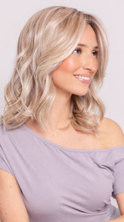 Ava wearing BRADSHAW by BELLETRESS in MILKSHAKE BLONDE R | A mixture of Light Sandy Brown, Highlighted with Light Ash Blonde with a Hint of Light Platinum Blonde with a Medium Root Color