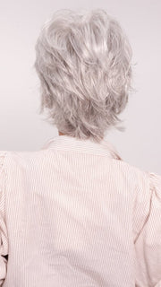 Roxie wearing VOLTAGE by RAQUEL WELCH in R56/60 SILVER MIST | Lightest Grey Evenly Blended with Pure White