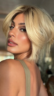 Roxie wearing JADORE DELUXE by ELLEN WILLE in PEARL BLONDE ROOTED | Pearl Platinum and Lightest Ash Blonde with Medium Ash Blonde Blend and Shaded Roots