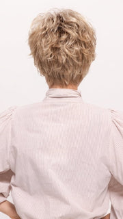 Roxie wearing SPARKLE by RAQUEL WELCH in SS14/88H SHADED GOLDEN WHEAT | Dark Blonde Evenly Blended with Pale Blonde Highlights and Dark Roots