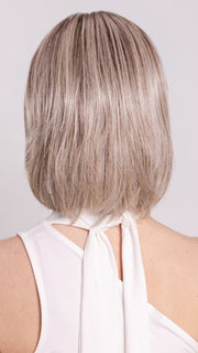 Ava wearing WINTOUR by BELLETRESS in COOL CHAI BLONDE-R | A balanced cool blonde with softly contrasted darker roots, a fresh twist on classic blonde tones.