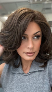 Roxie is wearing FLIP THE SCRIPT by RAQUEL WELCH in color RL4/6 BLACK COFFEE 