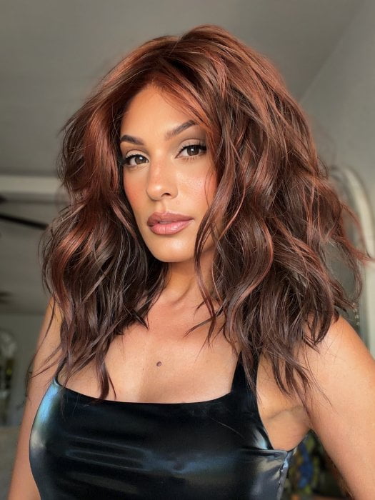 Roxie wearing BEACH WAVE MAGIC by TRESSALLURE in 10/130R | Bright Red with Medium Brown roots
10/130R | Bright Red with Medium Brown roots
