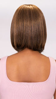 Model is wearing PAIGE PETITE by ENVY in color MEDIUM BROWN | Medium Brown with natural highlights