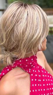 Roxie wearing MODENA by BELLETRESS in RAW SUGAR BLONDE | A Neutral Light Blonde, Honey Blonde, Pale Gold Blonde, with a base of Light Brown Lowlights featuring a Medium Root Color