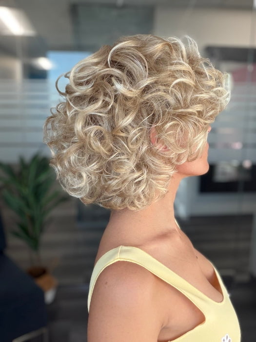 Roxie is wearing BOUYANT by GABOR in GL14-22SS SS SANDY BLONDE | Dark golden blonde base blends into multi-dimensional tones of medium gold blonde and light beige blonde