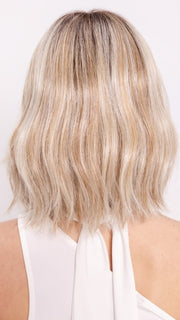 Ava wearing HOLLIE by JON RENAU in 101/88/27S8 CATALINA BLONDE | Pale blonde with Pure White Natural Violet halo highlights, shaded medium brown