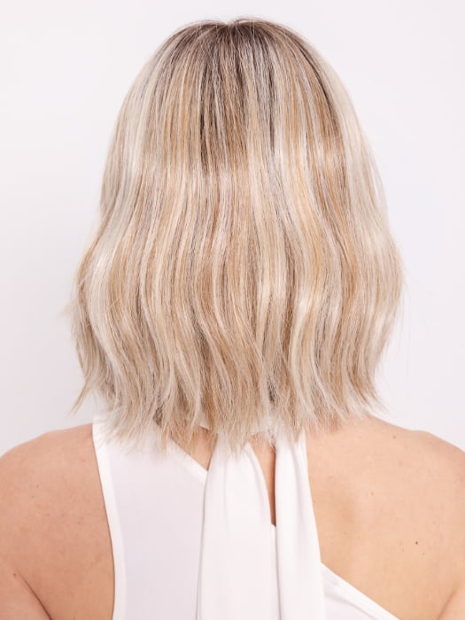 Ava wearing HOLLIE by JON RENAU in 101/88/27S8 CATALINA BLONDE | Pale blonde with Pure White Natural Violet halo highlights, shaded medium brown