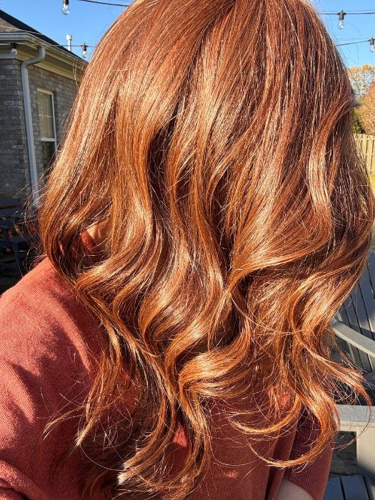Kristyna @kristynamoore wearing STATEMENT STYLE by RAQUEL WELCH in color RL32/31 CINNABAR | Medium Dark Auburn Evenly Blended with Medium Light Auburn