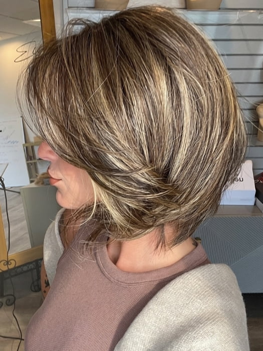 Madeline wearing FERRARI by BELLETRESS in CHOCOLATE BUTTERCREAM R | Medium and Dark Brown Rooted with a Blend of Medium Brown and Dark Blonde