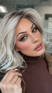 Roxie wearing NEWPORT by BELLETRESS in MILKSHAKE BLONDE R | A mixture of Light Sandy Brown, Highlighted with Light Ash Blonde with a Hint of Light Platinum Blonde with a Medium Root Color