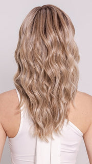 Ava wearing KELLY by BELLETRESS in BUTTERCAKE BLONDE-R | A neutral-warm blonde blend featuring light brown, ash, and lightest blonde tones with natural-looking darker roots for added depth and realism.