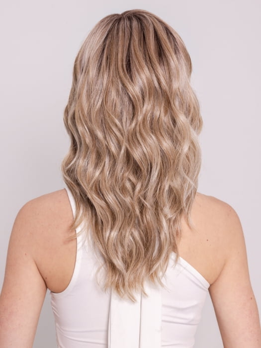 Ava wearing KELLY by BELLETRESS in BUTTERCAKE BLONDE-R | A neutral-warm blonde blend featuring light brown, ash, and lightest blonde tones with natural-looking darker roots for added depth and realism.