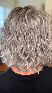 Eileen wearing GIRL MONO by ELLEN WILLE in STONE-GREY-ROOTED 56.60.58 | Dark/Lightest Brown and Lightest Blonde blended with Pearl White and a Grey Blend with Shaded Roots