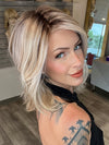 Madeline wearing PARK AVE by BELLETRESS in MILKSHAKE BLONDE R | A mixture of Light Sandy Brown, Highlighted with Light Ash Blonde with a Hint of Light Platinum Blonde with a Medium Root Color