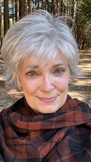 Mel B. @mels.be.ageless wearing VOLTAGE PETITE by RAQUEL WELCH WIGS in color RL51/61 ICED GRANITA | Lightest Grey Progresses to a Deep Grey at the Nape