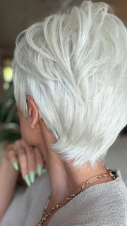 Roxie wearing CELINE by JON RENAU in 60 WINTER SUN | Pure White