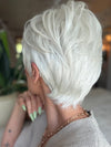 Roxie wearing CELINE by JON RENAU in 60 WINTER SUN | Pure White