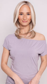 Ava wearing DREW by JON RENAU in 101/88/27S8 CATALINA BLONDE | Pale blonde with Pure White Natural Violet halo highlights, shaded medium brown
