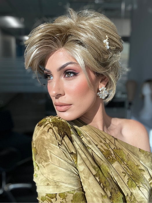 ROXIE wearing CAPTIVATING CANVAS by RAQUEL WELCH in RL13/88 Golden Pecan | Neutral Medium Blonde With Pale Honey Blonde Highlights